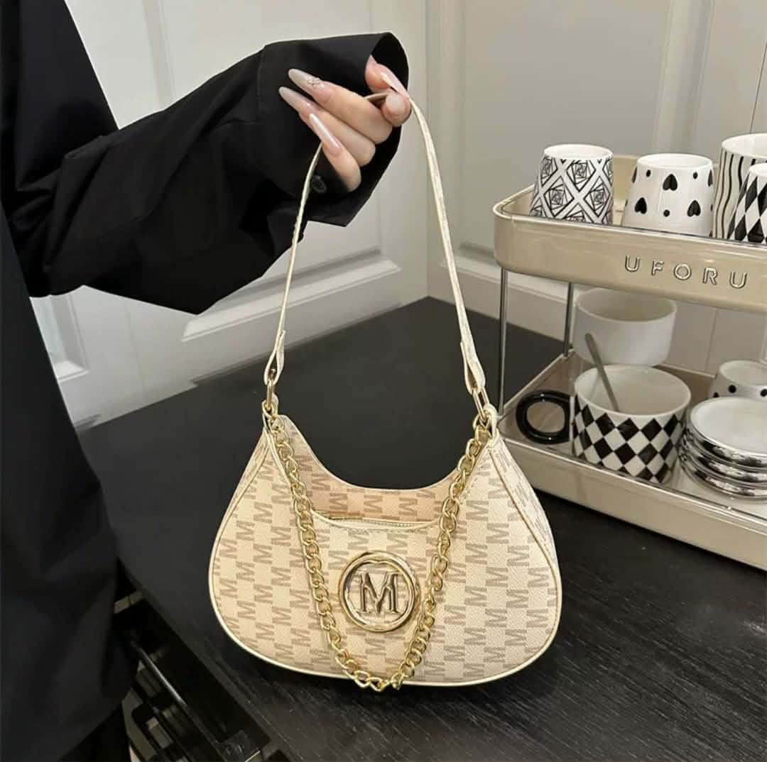 New M purse